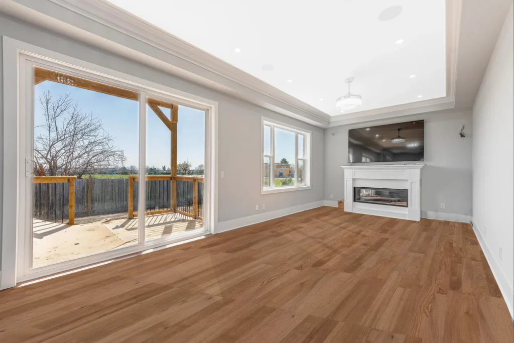 Family room with fireplace and rear deck access, 3102 Bonaventure