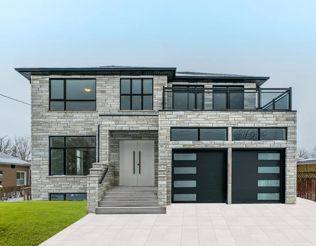 Full stone elevation with black glazing, 3114 Bonaventure, summer