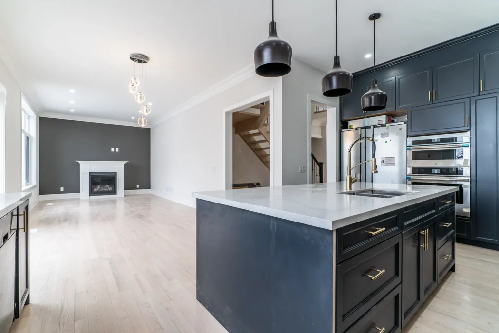 Waterfall island in a dark matte kitchen, 3114 Bonaventure