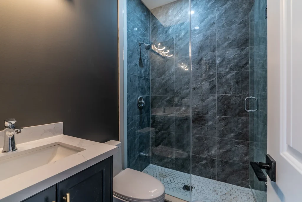 Dark marble shower detail, 3114 Bonaventure