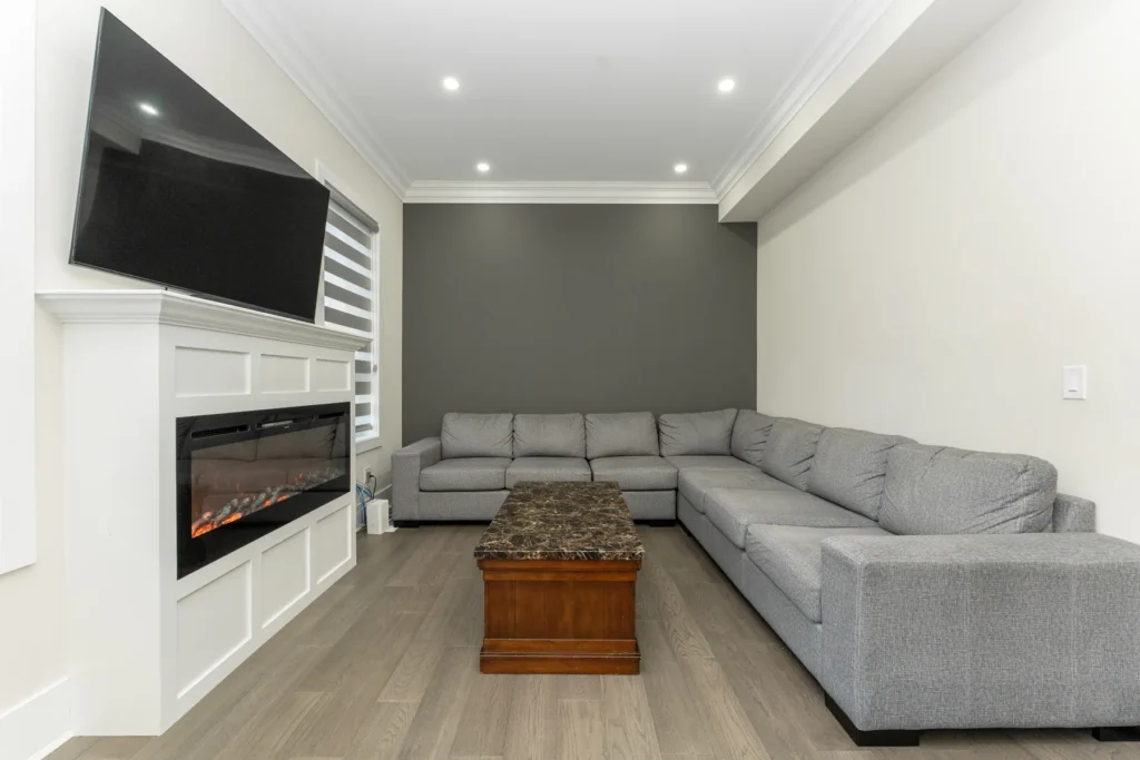 Living room with stone fireplace, Harrow Street